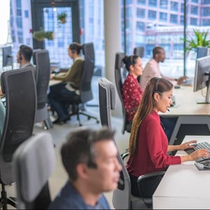 Customer service reps in high rise office