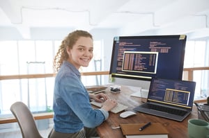 smiling computer programmer working